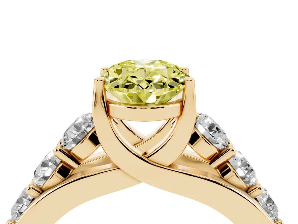 Fancy Yellow Oval Cut Diamond Engagement Ring with Pavé Band and Four-Prong Setting Yellow gold