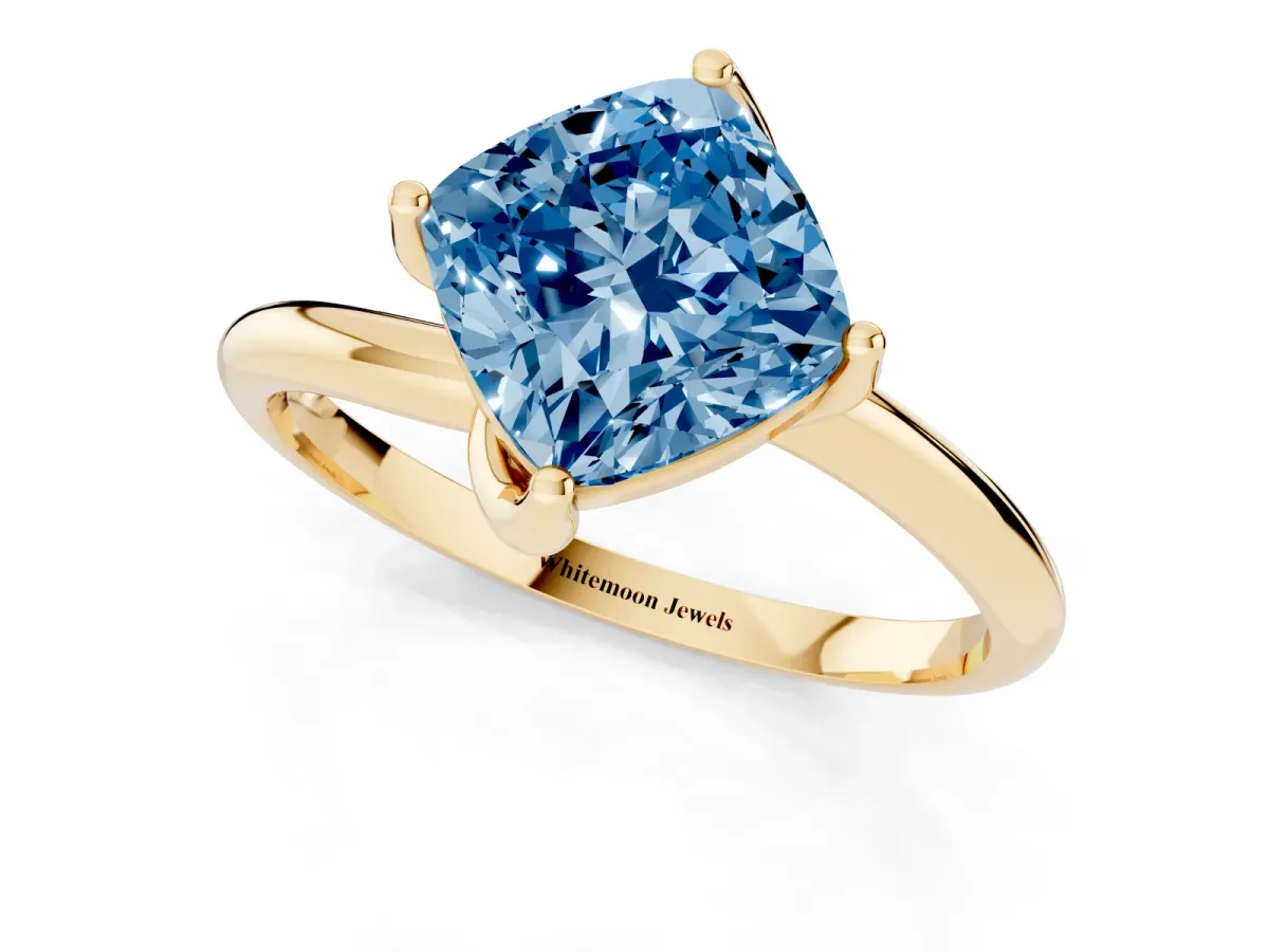Fancy Blue Cushion Cut Diamond Solitaire Engagement Ring with Four-Prong Setting and Classic Band Yellow gold