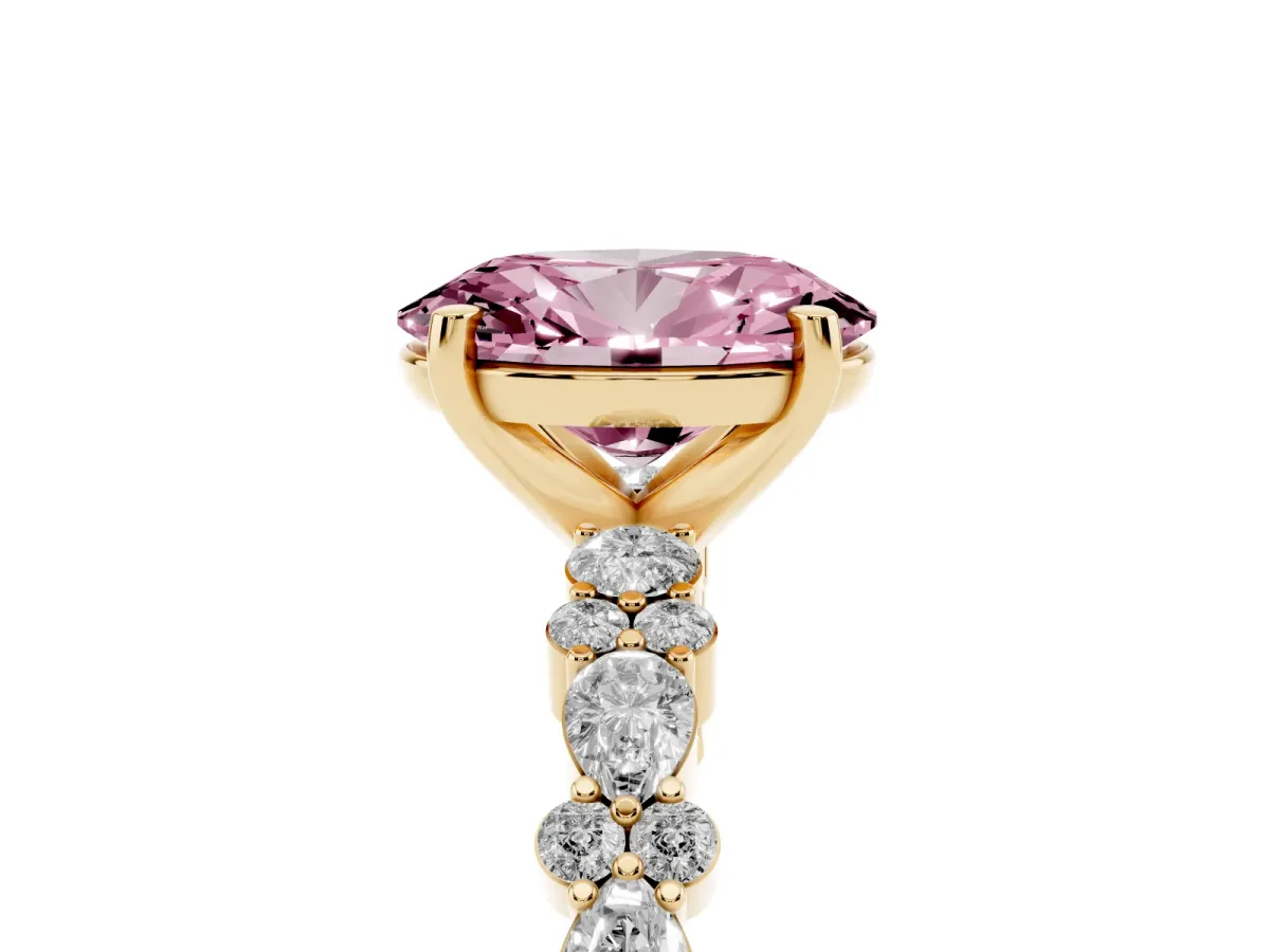 Fancy Pink Oval Cut Diamond Side Stone Solitaire Ring with Round and Four-Prong Setting Yellow gold