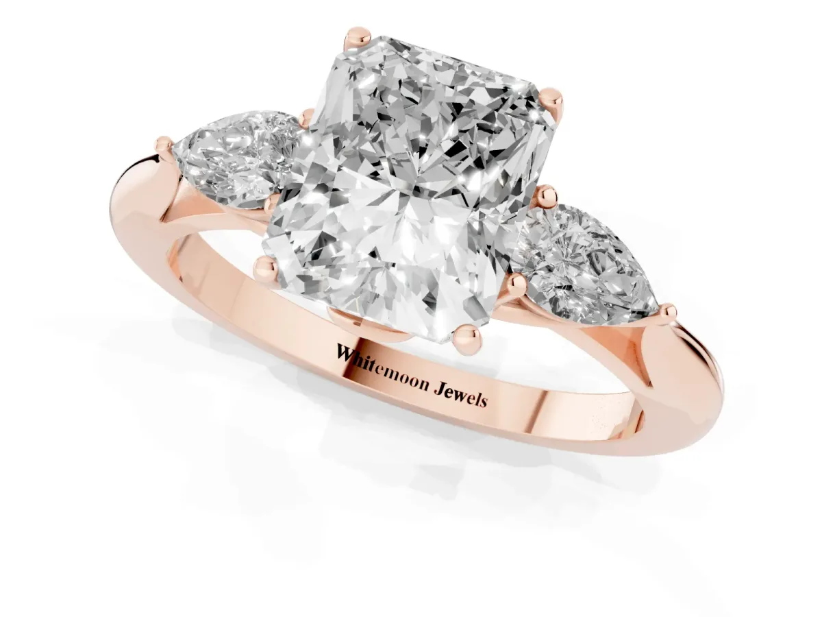 Radiant Cut Diamond Three-Stone Ring with Pear Side Stones and Prong Setting Rose gold
