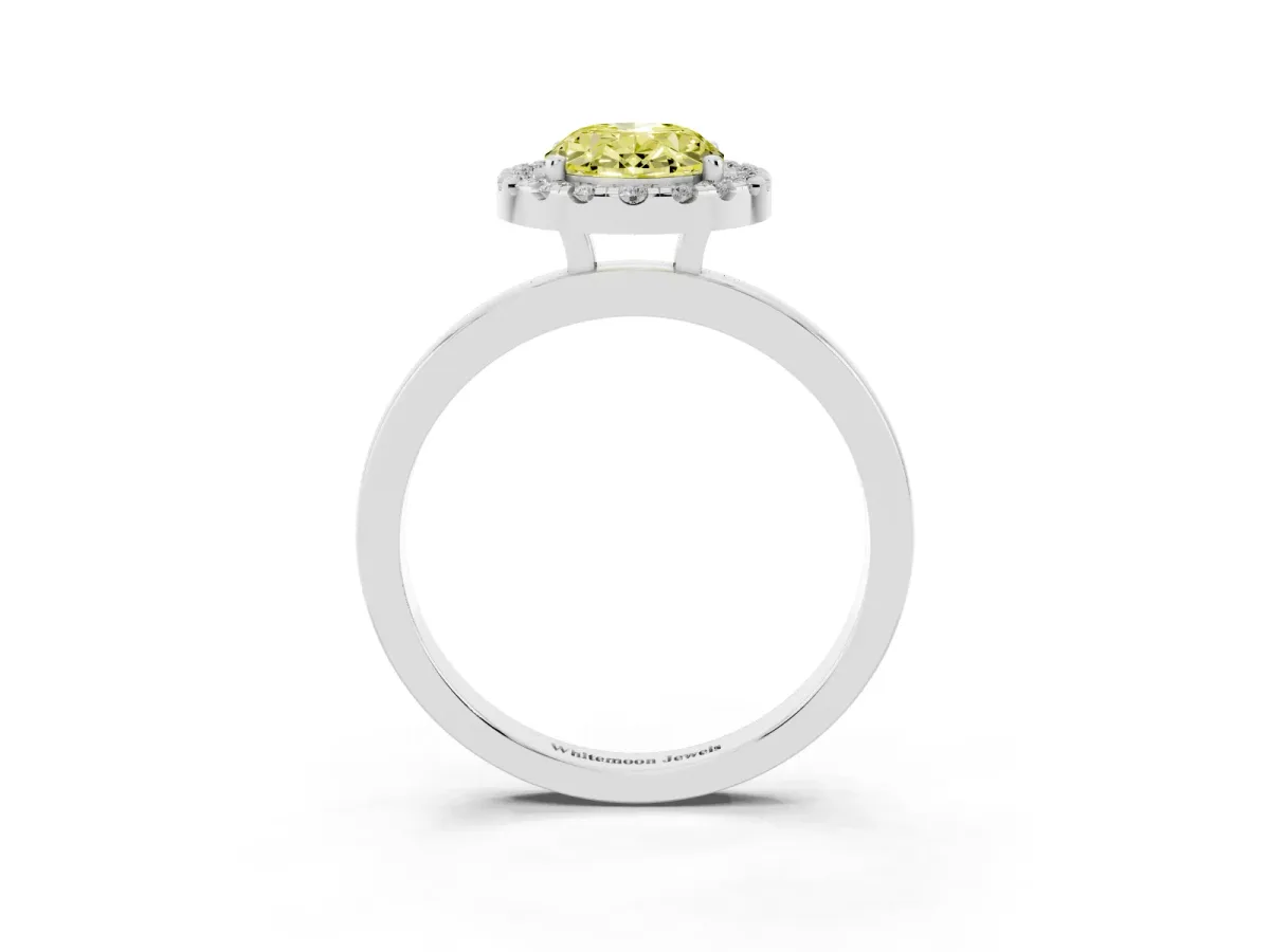Fancy Yellow Oval Cut Halo Diamond Solitaire with Pavé Band and Four-Prong Setting Platinum