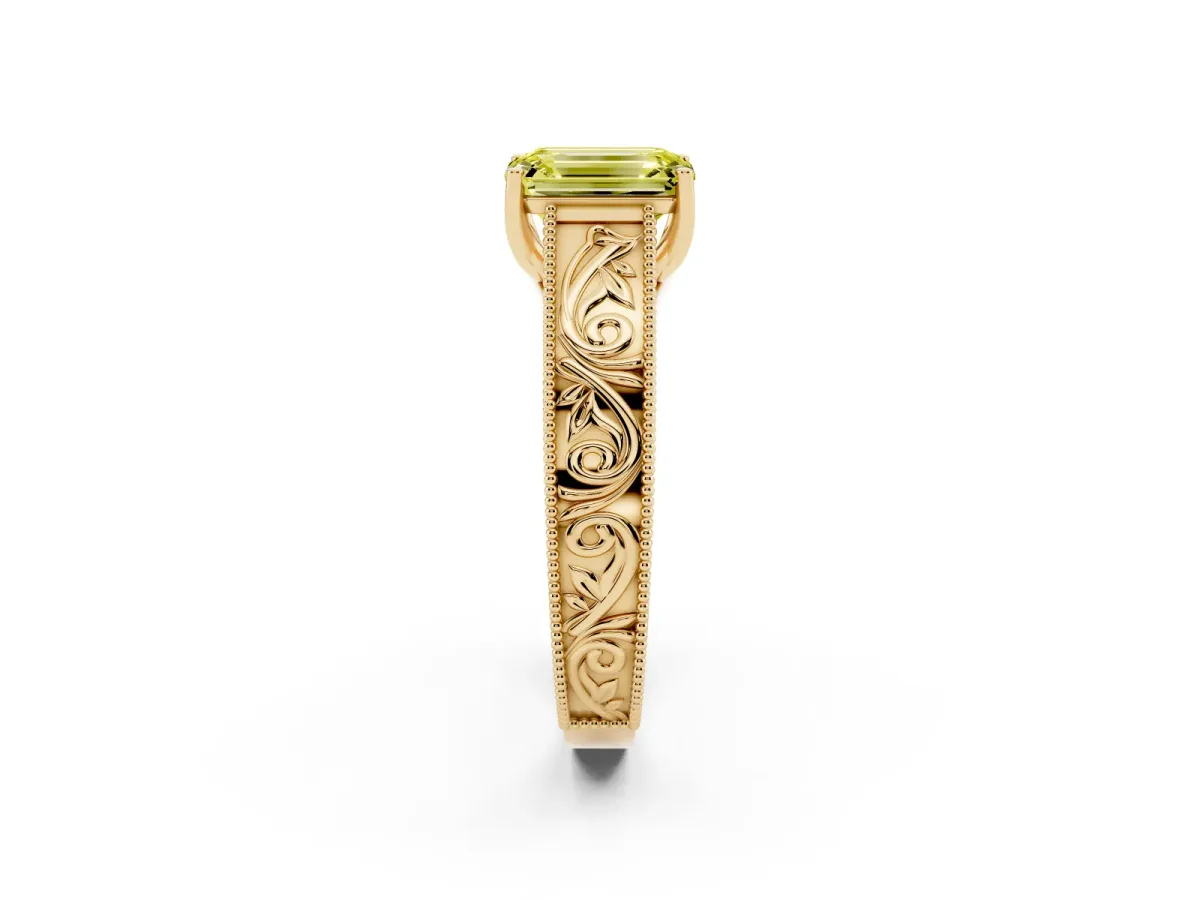 Fancy Yellow Emerald Cut Diamond Solitaire Ring with Engraved Band and Four-Prong Setting Yellow gold