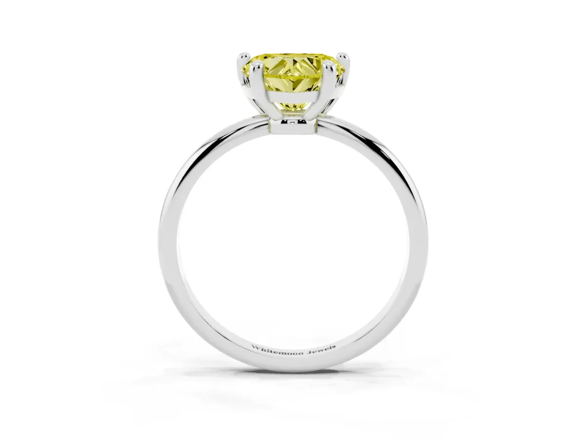 Fancy Yellow Heart Cut Solitaire Diamond Ring with 4-Prong Setting on a Classic Band Silver
