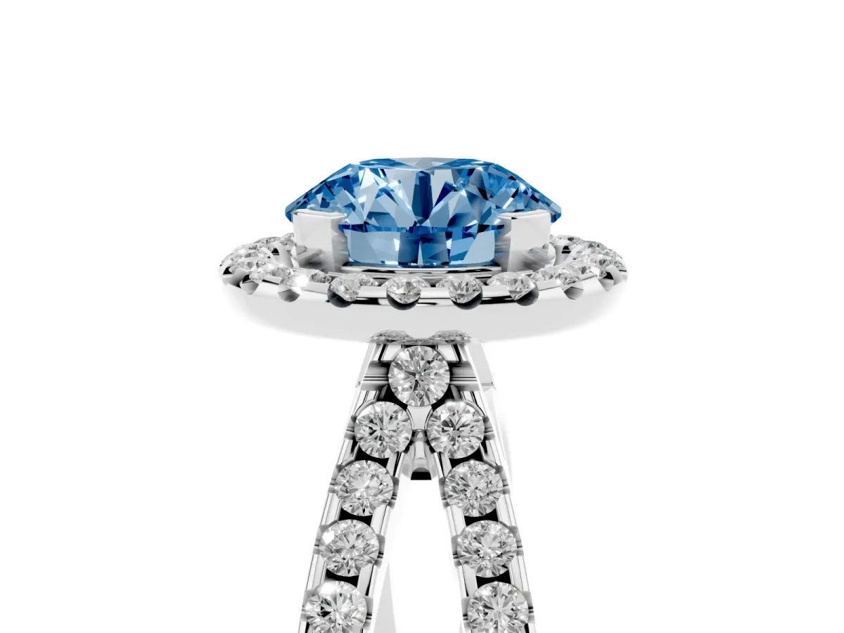 Fancy Blue Round Cut Diamond Halo Ring with Split Shank Pavé Band and Prong Setting Silver