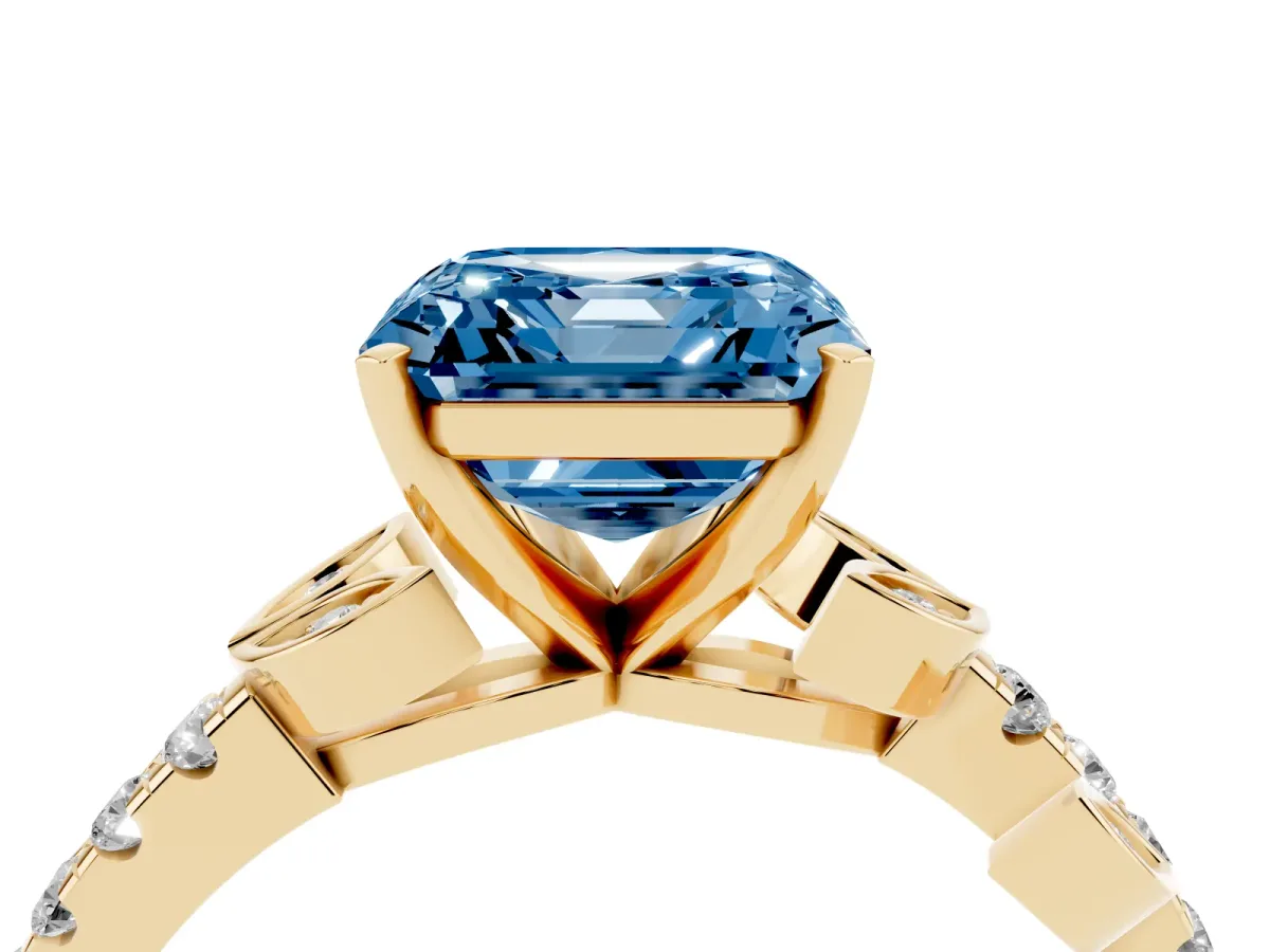 Fancy Blue Asscher Cut Solitaire Leaf-Inspired Diamond Ring with Pavé Band and Four-Prong Setting Yellow gold