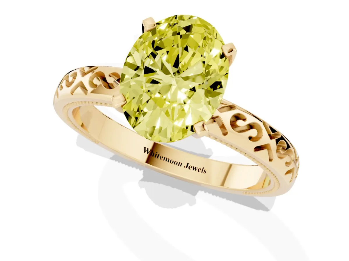 Fancy Yellow Oval Cut Solitaire Engagement Ring with Scrollwork Band and Four-Prong Setting Yellow gold