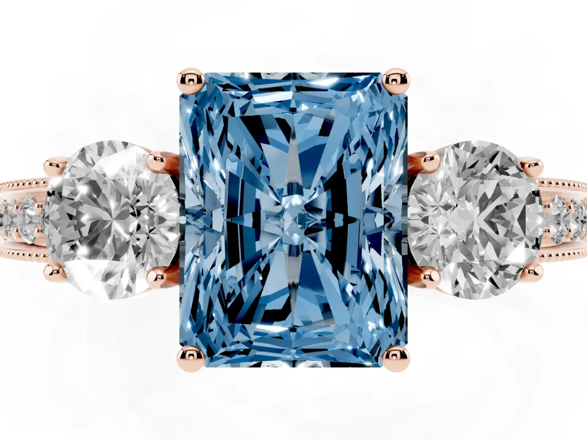Fancy Blue Radiant Cut Three-Stone Diamond Ring with Pavé Band and Four-Prong Setting Rose gold