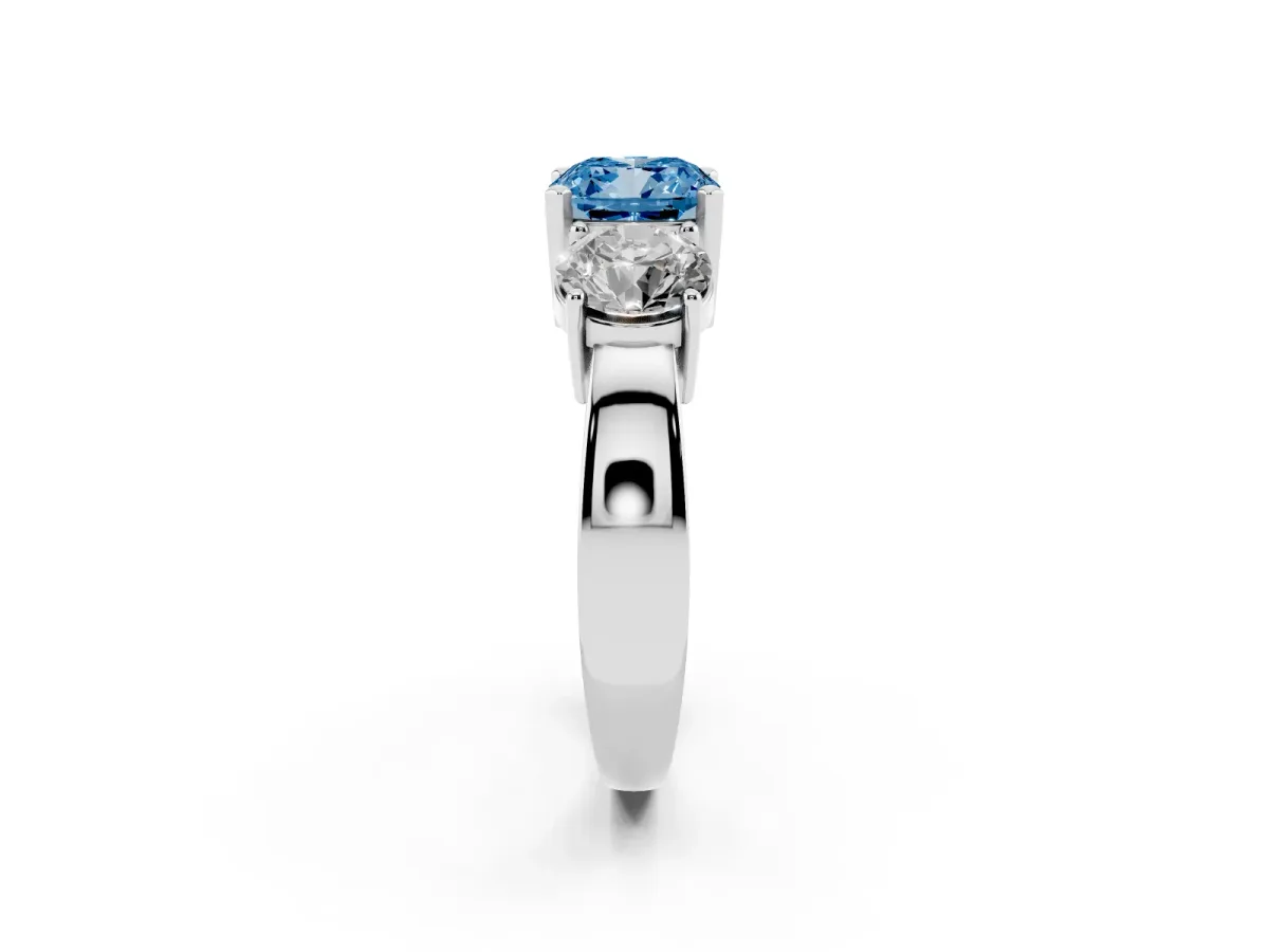 Fancy Blue Three-Stone Cushion Cut Diamond Ring with Round Side Stones, Classic Band, and Four-Prong Setting White gold