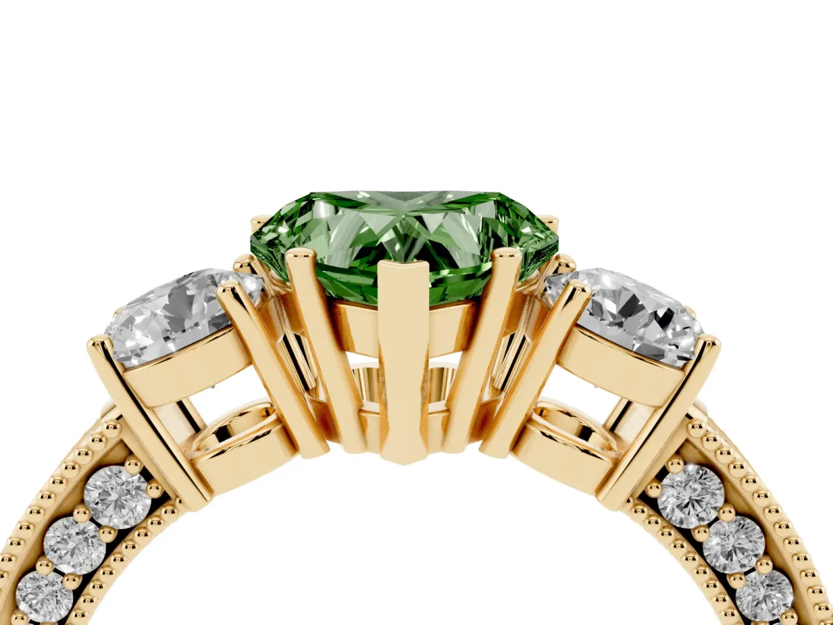 Fancy Green Heart Cut Three-Stone Diamond Ring with Pavé Band and Four-Prong Setting Yellow gold