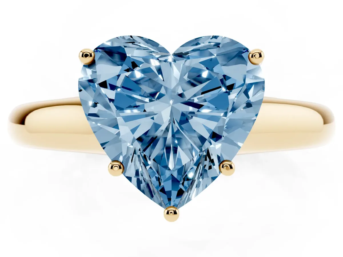 Fancy Blue Heart Cut Cut Diamond Solitaire Engagement Ring with Tapered Plain Band and Four-Prong Setting Yellow gold