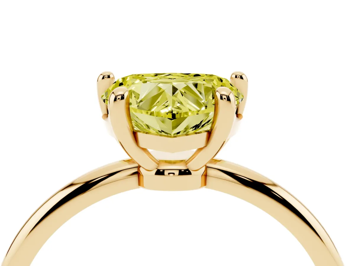Fancy Yellow Heart Cut Solitaire Diamond Ring with 4-Prong Setting on a Classic Band Yellow gold