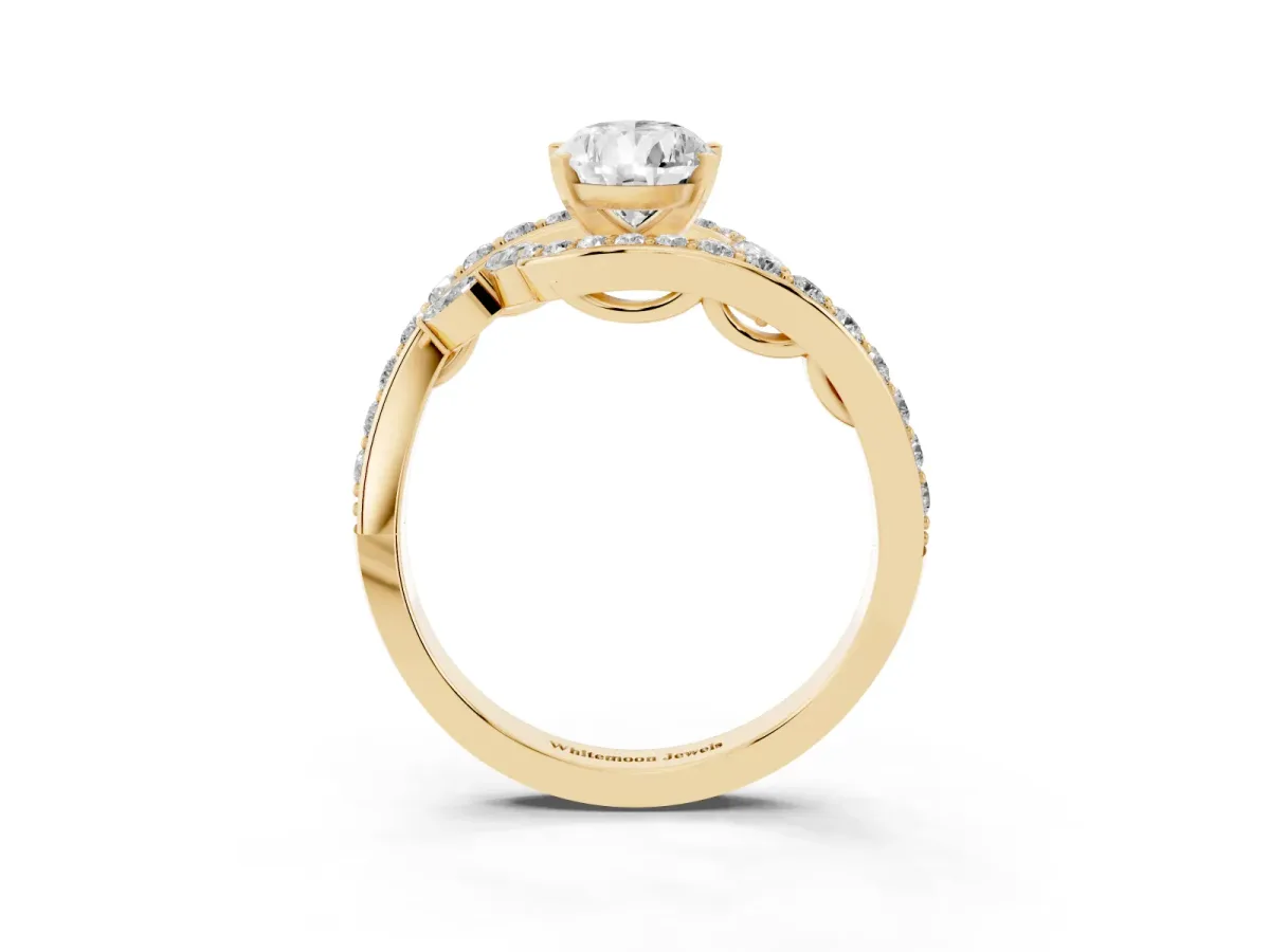 Pear Cut Solitaire with Pavé Twist Band and Four-Prong Setting Yellow gold