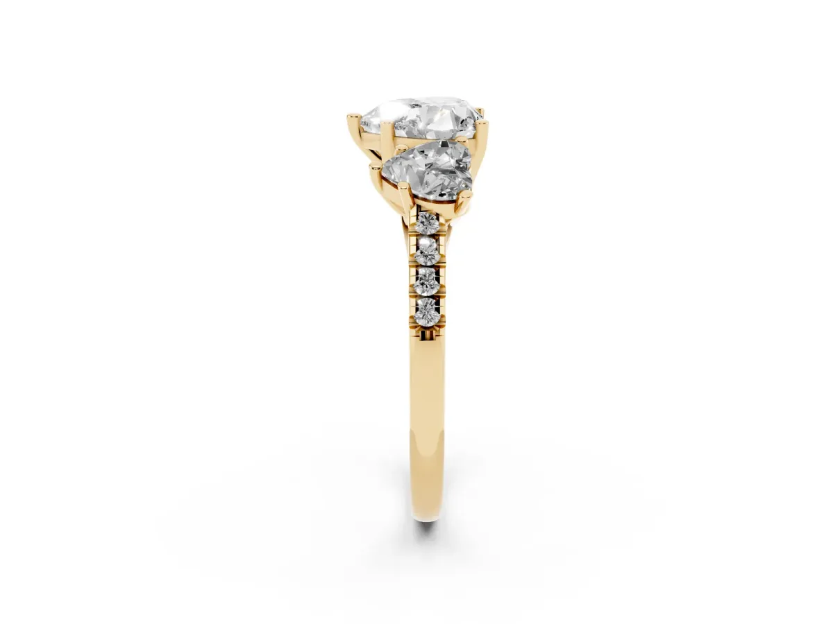 Three-Stone Heart Cut Diamond Ring with Round Pavé Band and Prong Setting Yellow gold