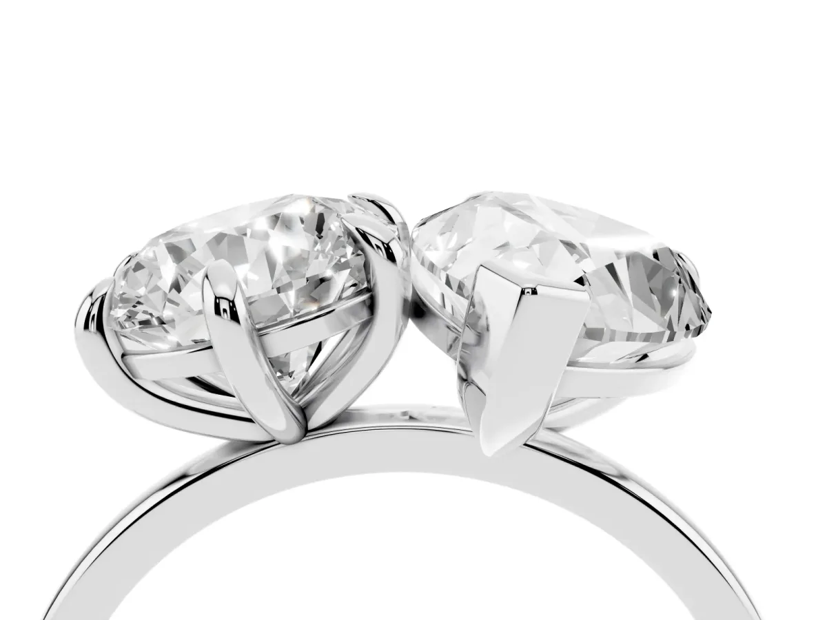 Round and Pear Toi Moi Ring with Prong Setting and Plain Band Platinum