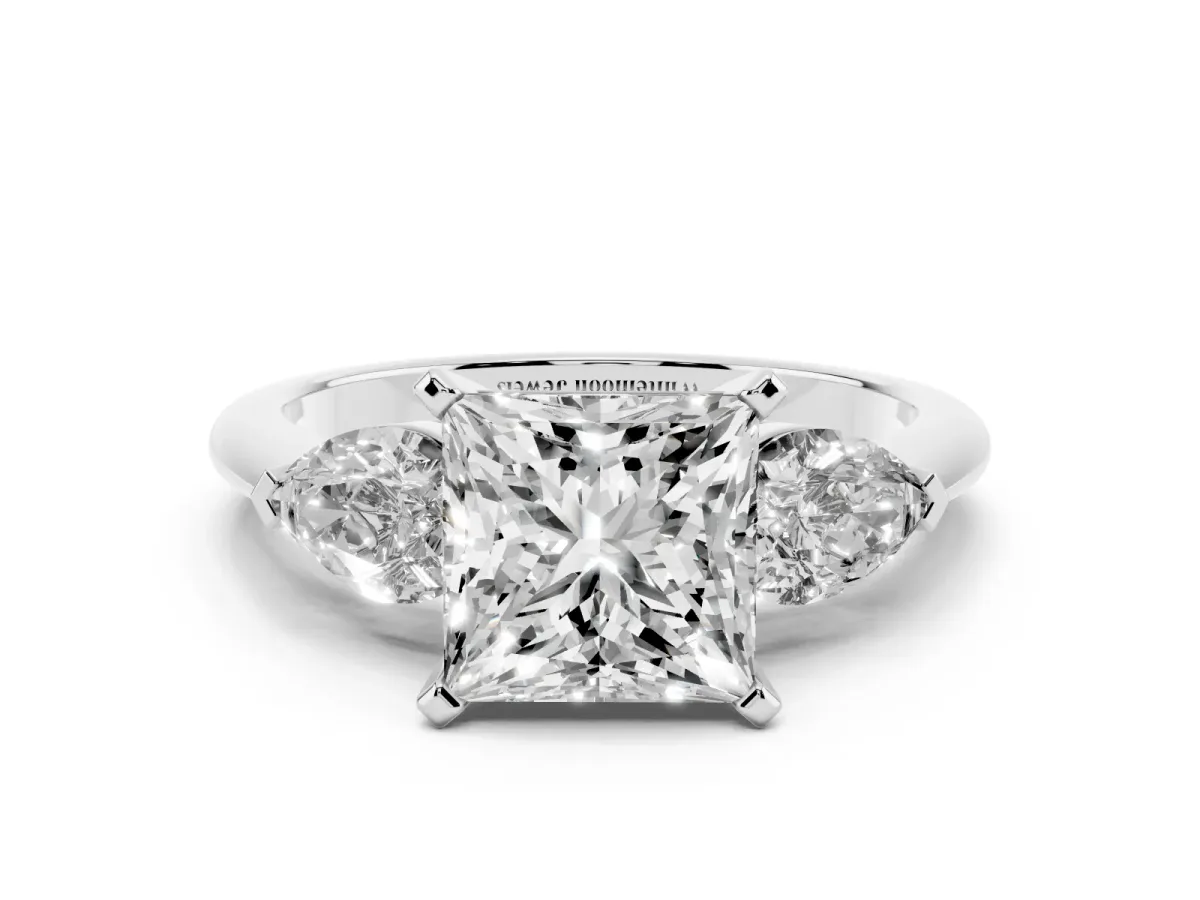 Three-Stone Princess Cut Diamond Ring with Pear Side Stones and Four-Prong Setting Platinum