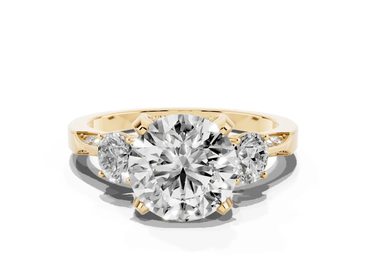 Round Cut Brilliant Three-Stone Diamond Ring with Pavé Band and Four-Prong Setting Yellow gold