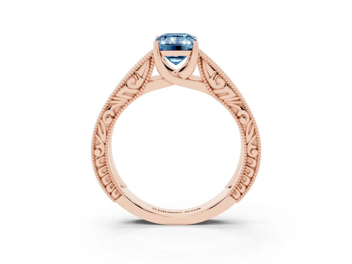 Fancy Blue Emerald Cut Diamond Solitaire Ring with Engraved Band and Four-Prong Setting Rose gold