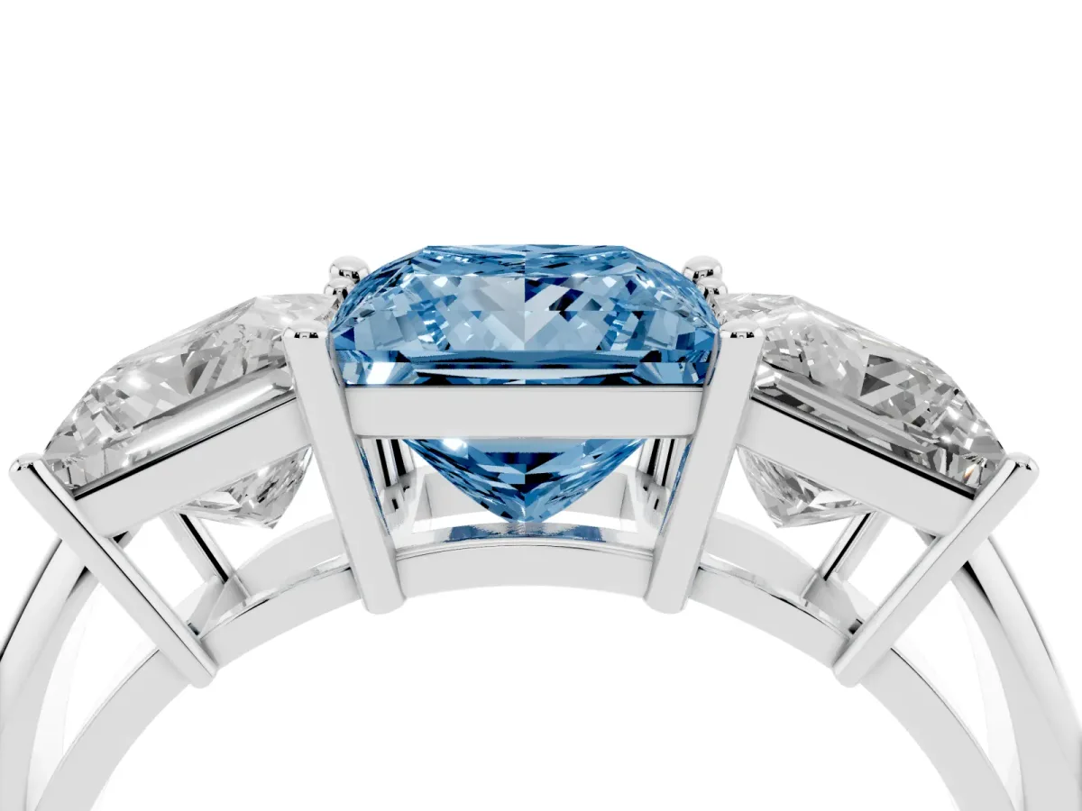 Fancy Blue Three-Stone Princess Cut Cut Diamond Engagement Ring with Prong Setting on a White Gold Band Silver