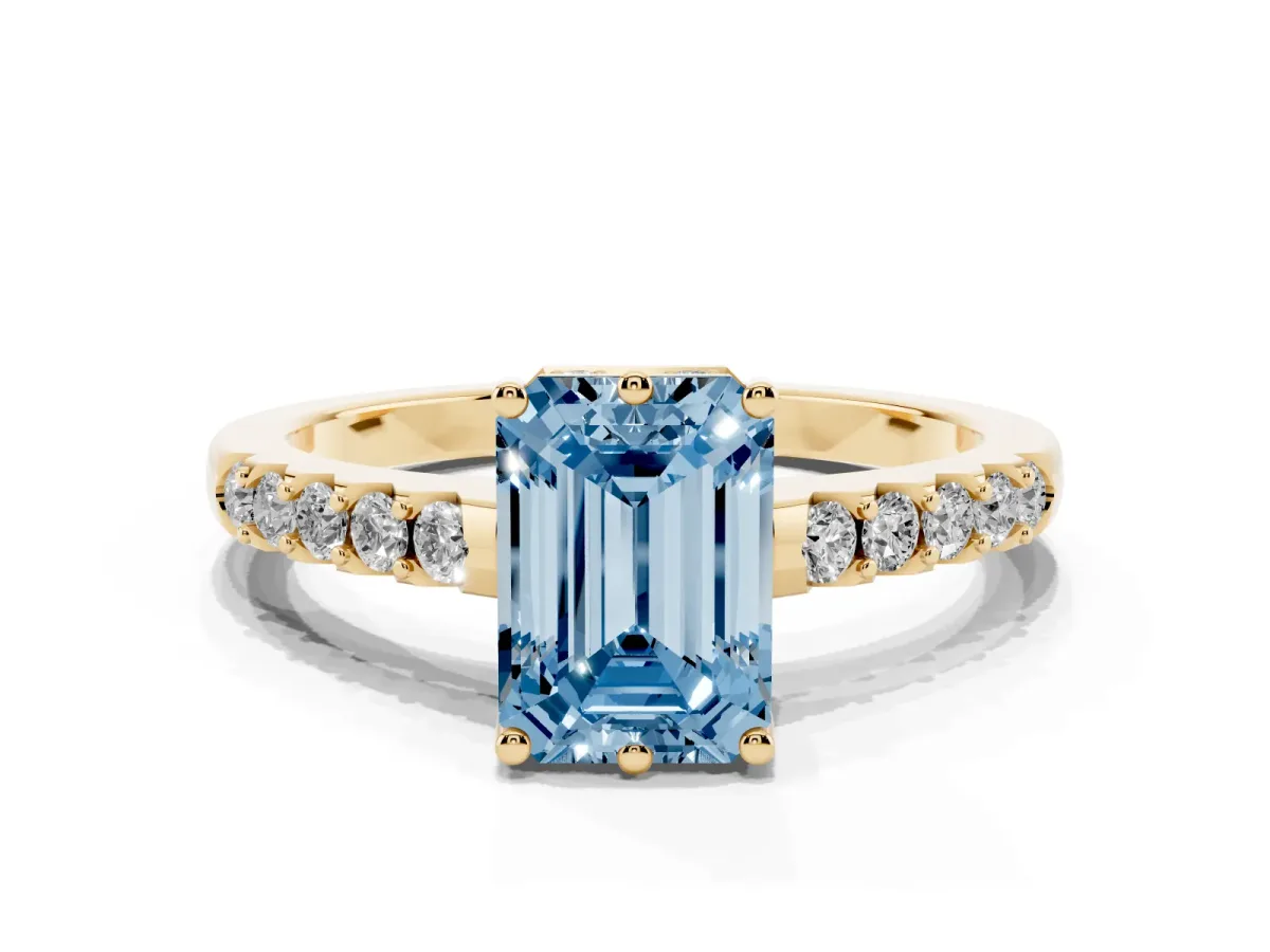 Fancy Blue Emerald Cut Solitaire Diamond Engagement Ring with Pavé Band and Six-Prong Setting Yellow gold