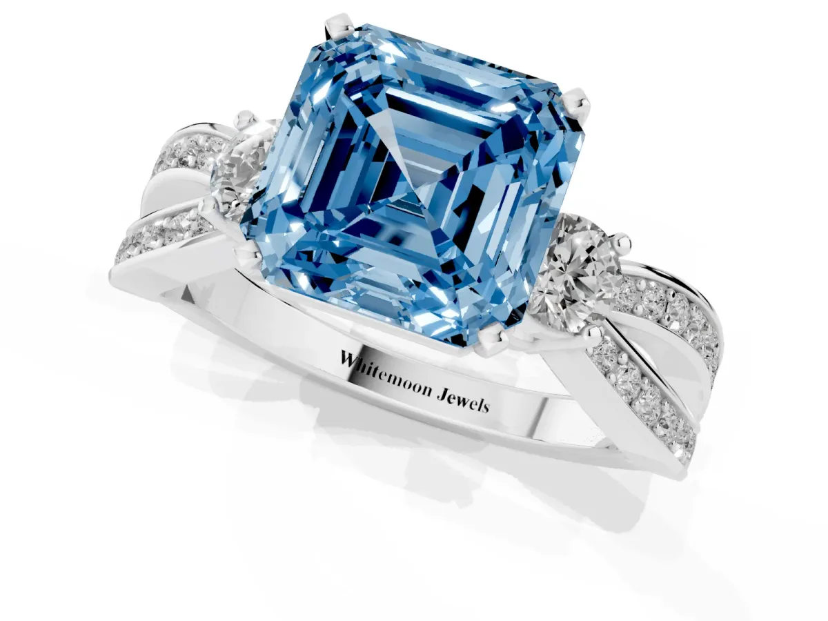 Fancy Blue Three-Stone Asscher Cut Cut Diamond Twist Band with Prong Setting Platinum