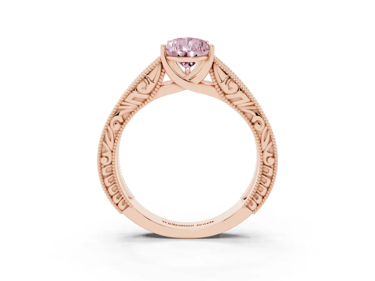Fancy Pink Pear Cut Diamond Solitaire Ring with Engraved Band and Four-Prong Setting Rose gold