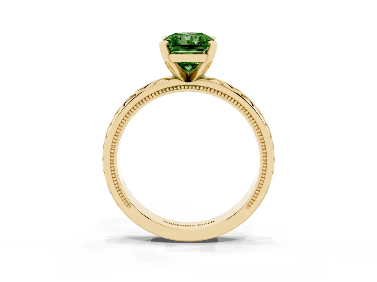 Fancy Green Radiant Cut Solitaire Diamond Ring with Milgrain and Black Enamel X Pattern Band Yellow gold