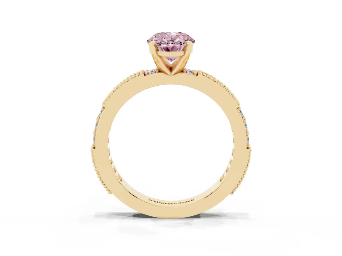 Fancy Pink Oval Cut Solitaire with Pavé Band and Four-Prong Setting Yellow gold