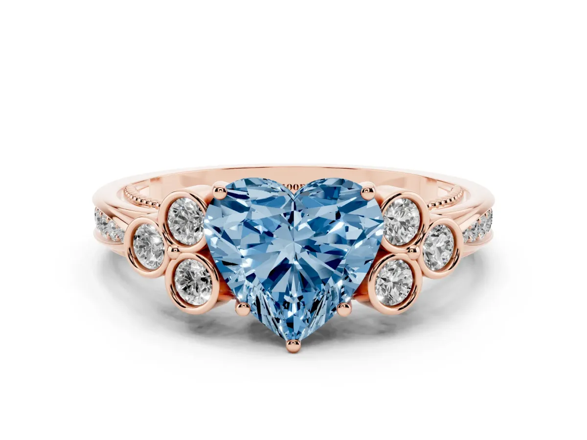 Fancy Blue Heart Cut Cut Diamond Engagement Ring with Bezel Set Round Side Stones and Prong Setting Rose gold