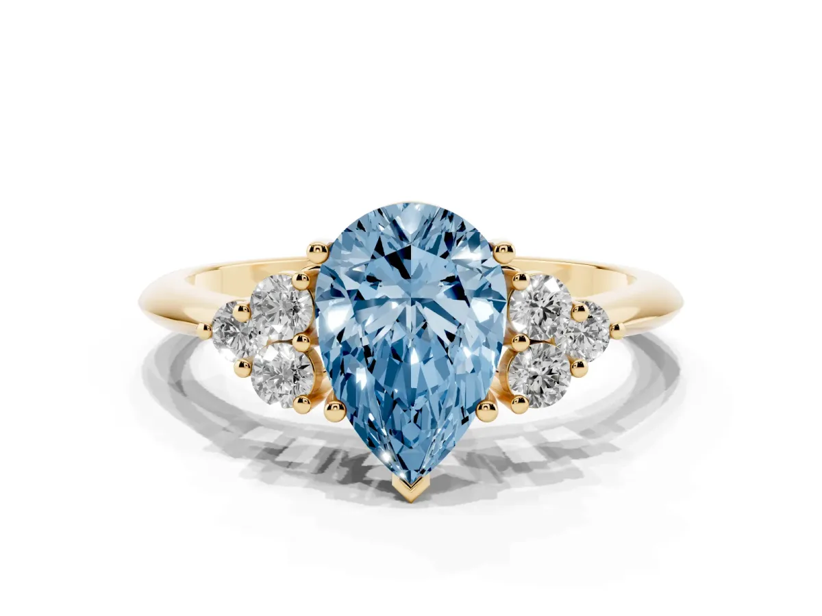 Fancy Blue Pear Cut Cut Diamond Cluster Ring with Solitaire Band and Four-Prong Setting Yellow gold