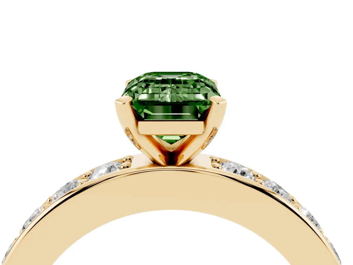 Fancy Green Emerald Cut Diamond Engagement Ring with Channel Set Round Band and Prong Setting Yellow gold