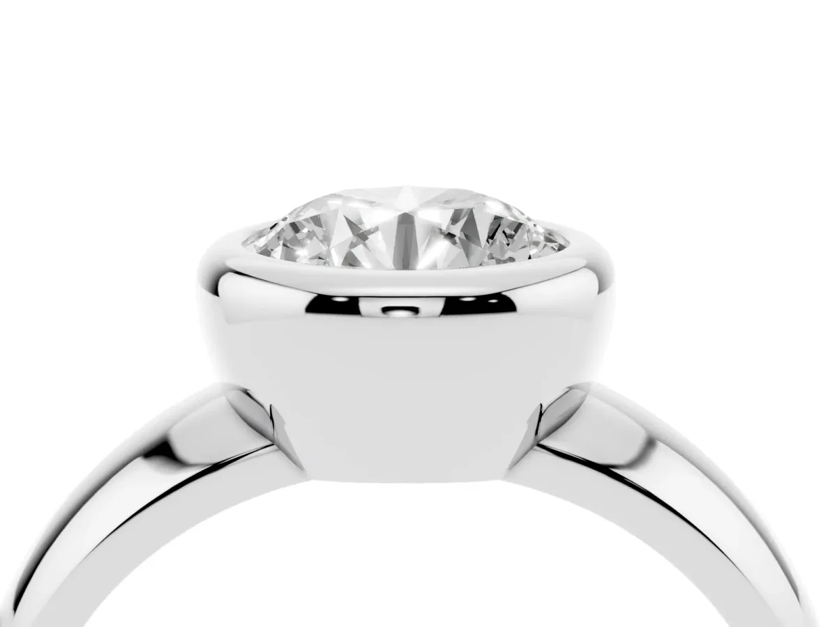 Bezel Set Round Cut Solitaire Ring with Wide Band Platinum
