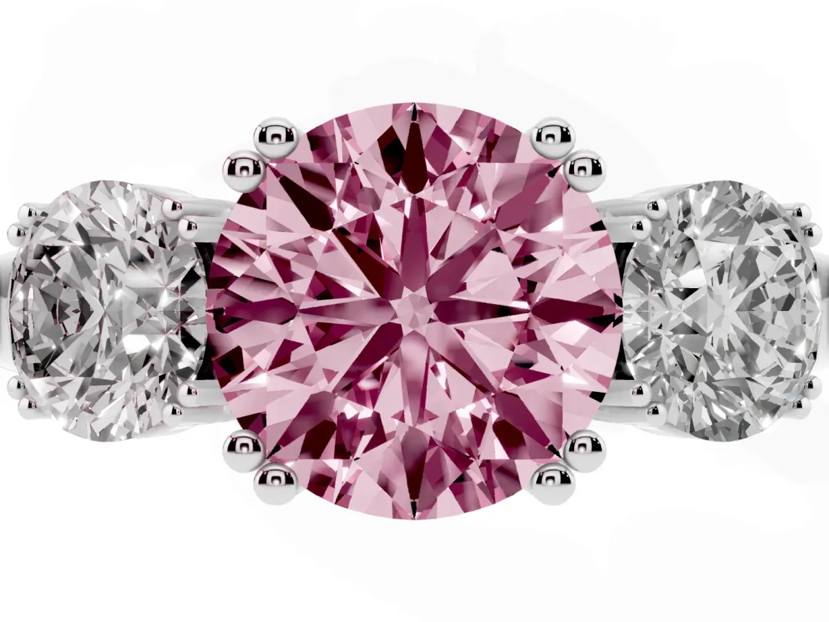 Fancy Pink Three-Stone Round Cut Cut Diamond Ring with Channel Set Band and Four-Prong Setting White gold