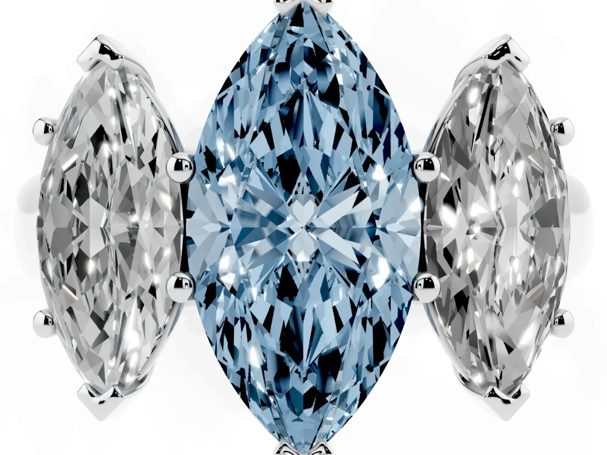 Fancy Blue Marquise Cut Three-Stone Diamond Ring with Prong Setting on a Classic Band Silver