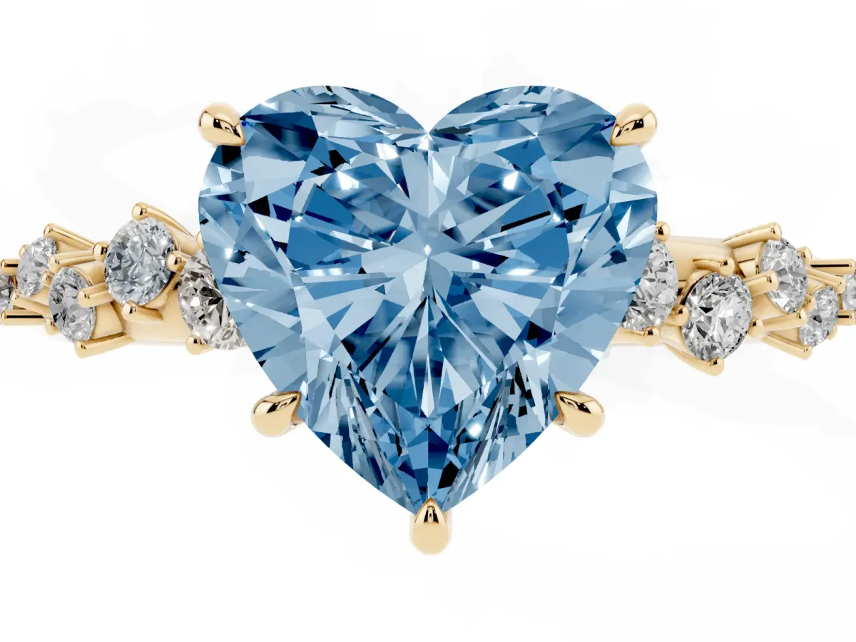 Fancy Blue Heart Cut Diamond Cluster Side Stone Solitaire Ring with Prong Setting Yellow gold
