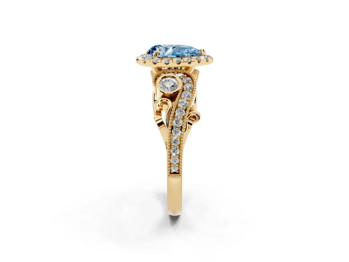 Fancy Blue Pear Cut Diamond Halo Ring with Milgrain Pavé Band and Four-Prong Setting Yellow gold