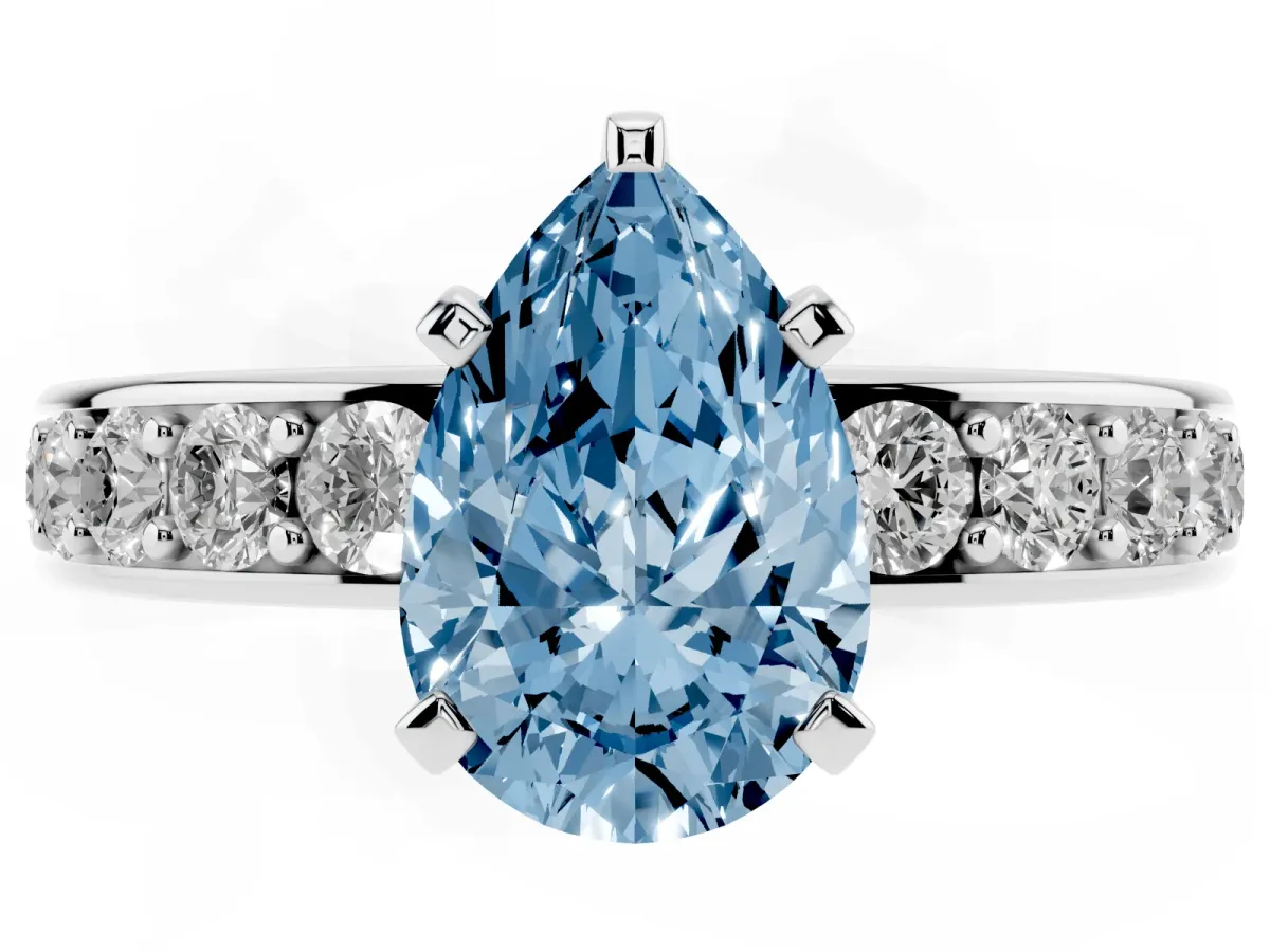 Fancy Blue Pear Cut Diamond Engagement Ring with Channel Set Round Band and Prong Setting Silver