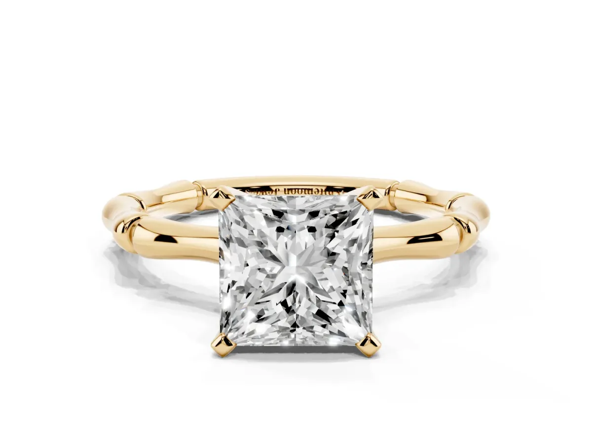 Princess Cut Solitaire Diamond Ring with Bamboo Band and Four-Prong Setting Yellow gold