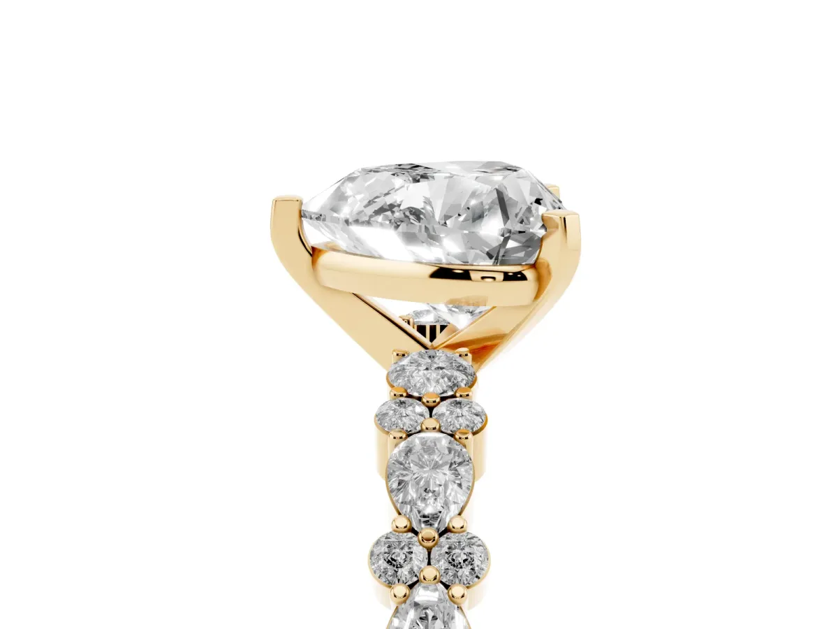 Heart Cut Diamond Side Stone Solitaire Ring with Round and Four-Prong Setting Yellow gold