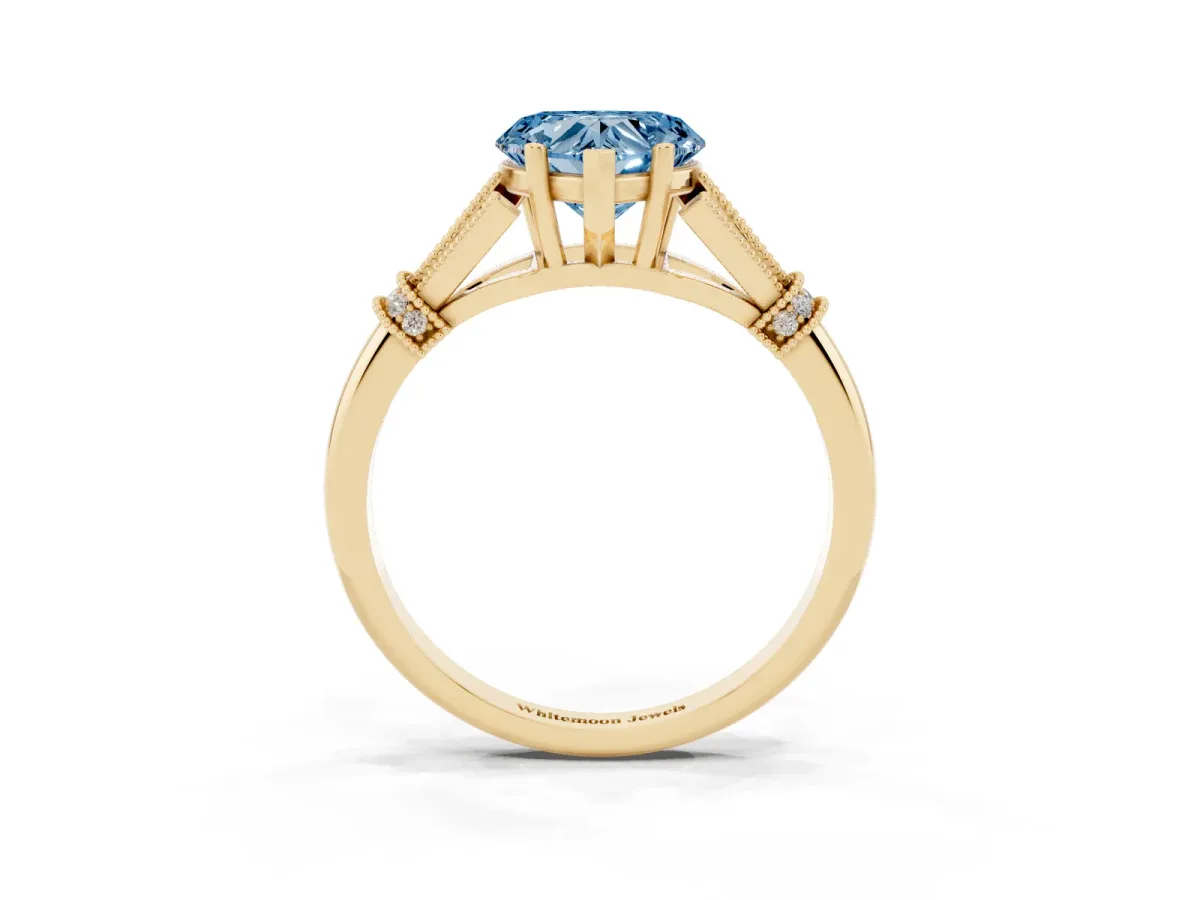 Fancy Blue Heart Cut Diamond Solitaire Ring with Floral Filigree and Pave Accents Yellow gold