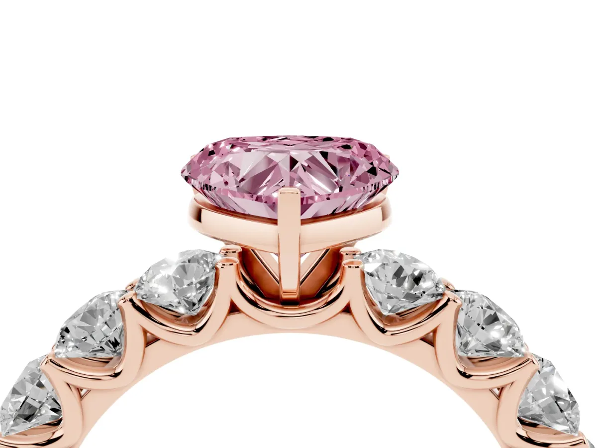 Fancy Pink Heart Cut Diamond Prong Setting with Side Stones on a Pave Band Rose gold