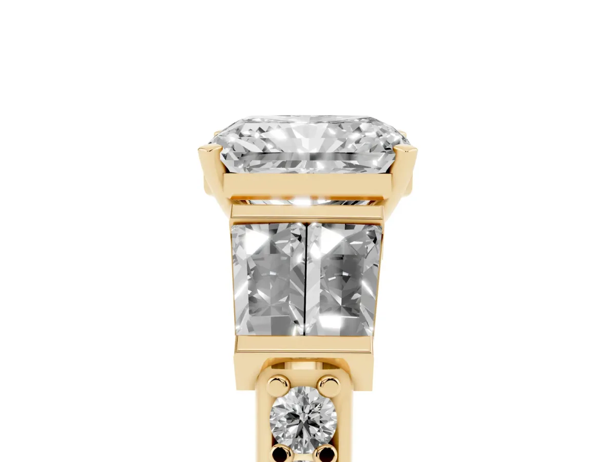 Radiant Cut Diamond Engagement Ring with Baguette Side Stones and Channel Set Band Yellow gold