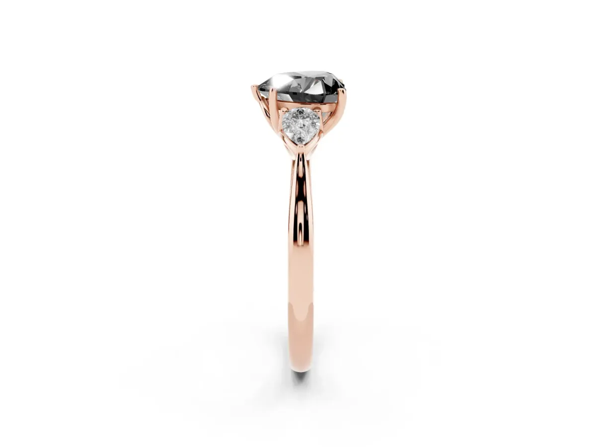 Fancy Black Heart Cut Diamond Three-Stone Ring with Pear Side Stones and Prong Setting Rose gold