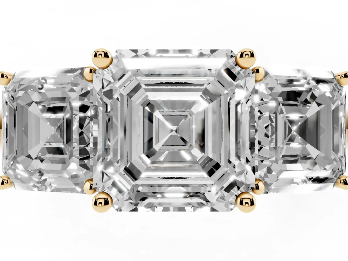 Three-Stone Asscher Cut Cut Diamond Engagement Ring with Prong Setting on a White Gold Band Yellow gold