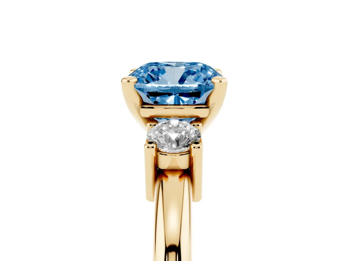Fancy Blue Three-Stone Cushion Cut Cut Diamond Solitaire with Prong Setting and Classic Band Yellow gold