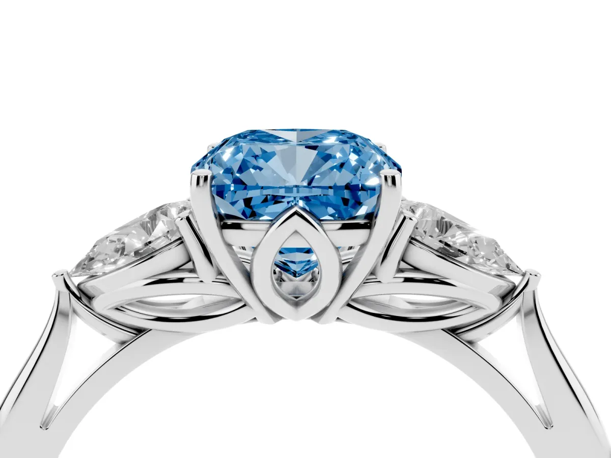 Fancy Blue Three-Stone Cushion Cut Diamond Ring with Pear Side Stones in Four-Prong Setting Silver