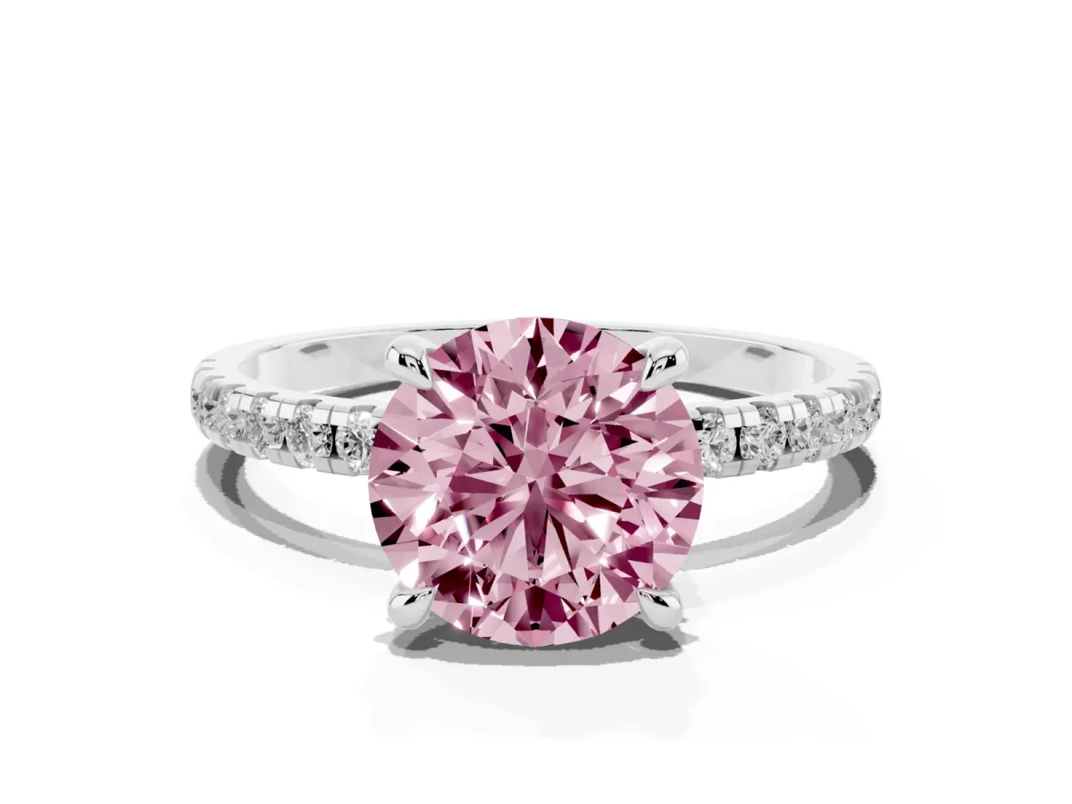 Fancy Pink Round Cut Diamond Brilliant Solitaire Ring with Pavé Band and Four-Prong Setting Silver