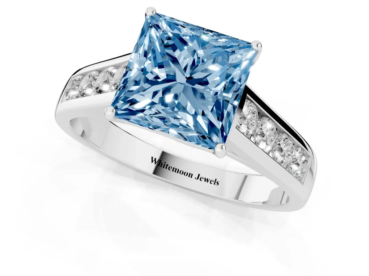 Fancy Blue Princess Cut Brilliant Channel-Set Solitaire Ring with Four-Prong Setting Silver