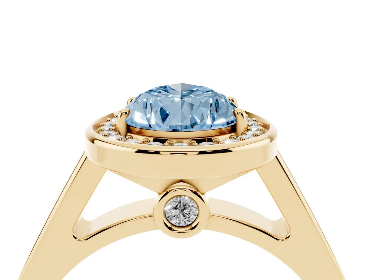Fancy Blue Pear Cut Halo Solitaire Diamond Ring with Pave Band and Bezel Setting Yellow gold