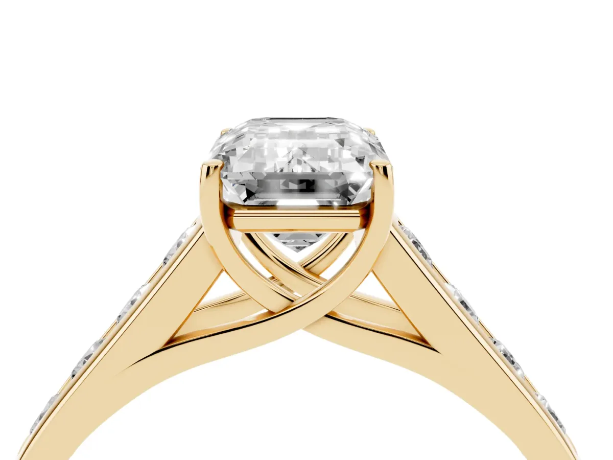 Emerald Cut Brilliant Channel-Set Solitaire Ring with Four-Prong Setting Yellow gold
