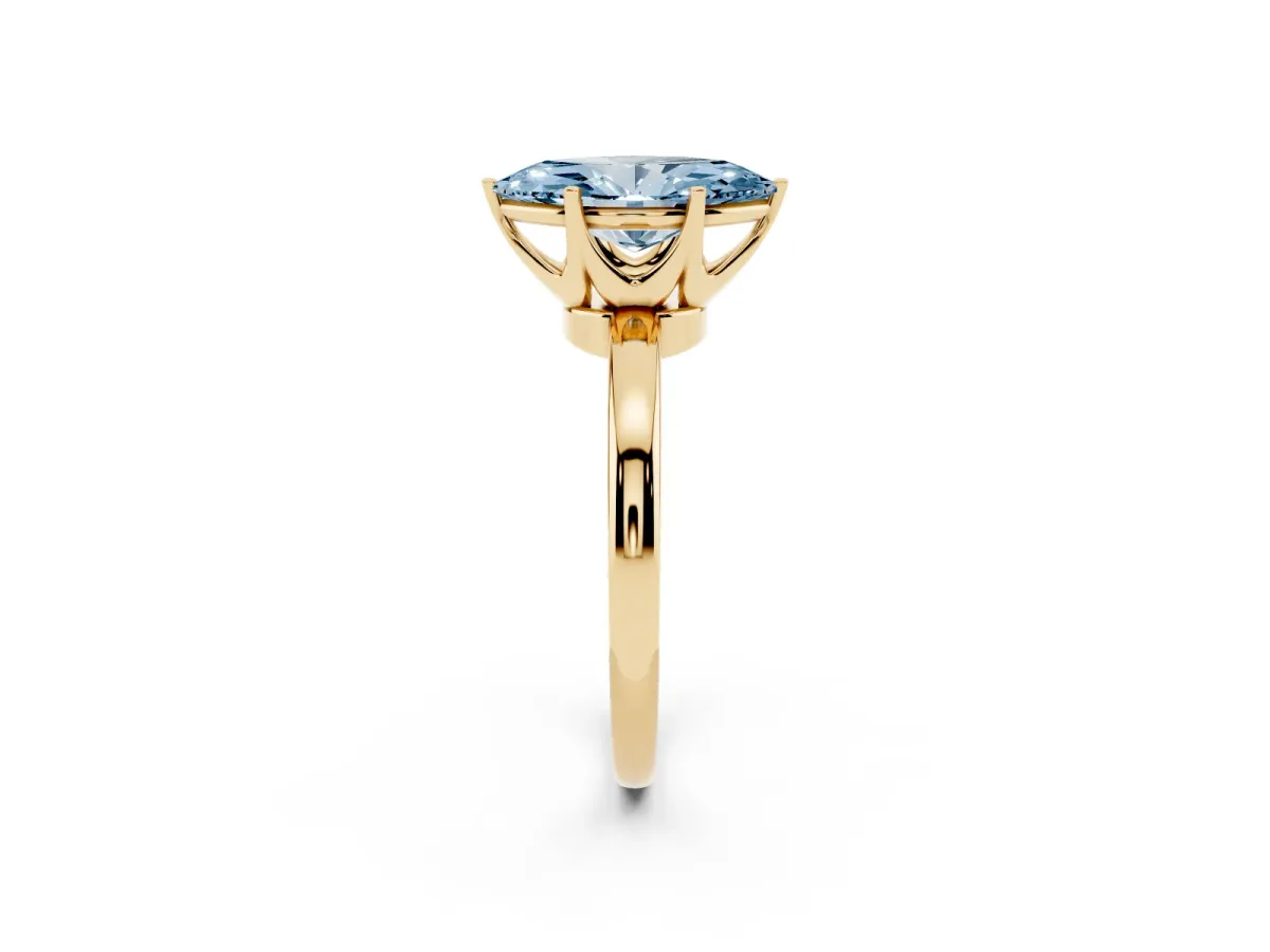 Fancy Blue Marquise Cut Solitaire Diamond Ring with Six-Prong Setting on a Classic Band Yellow gold